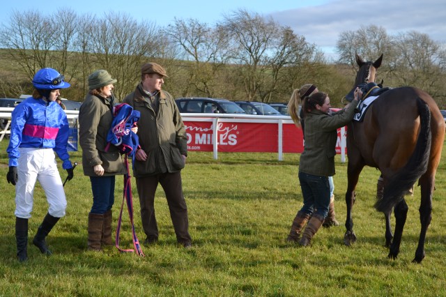 Emily Rucker is ready to be legged up on Stonemaster while mum Angela Rucker and dad William Rucker look on