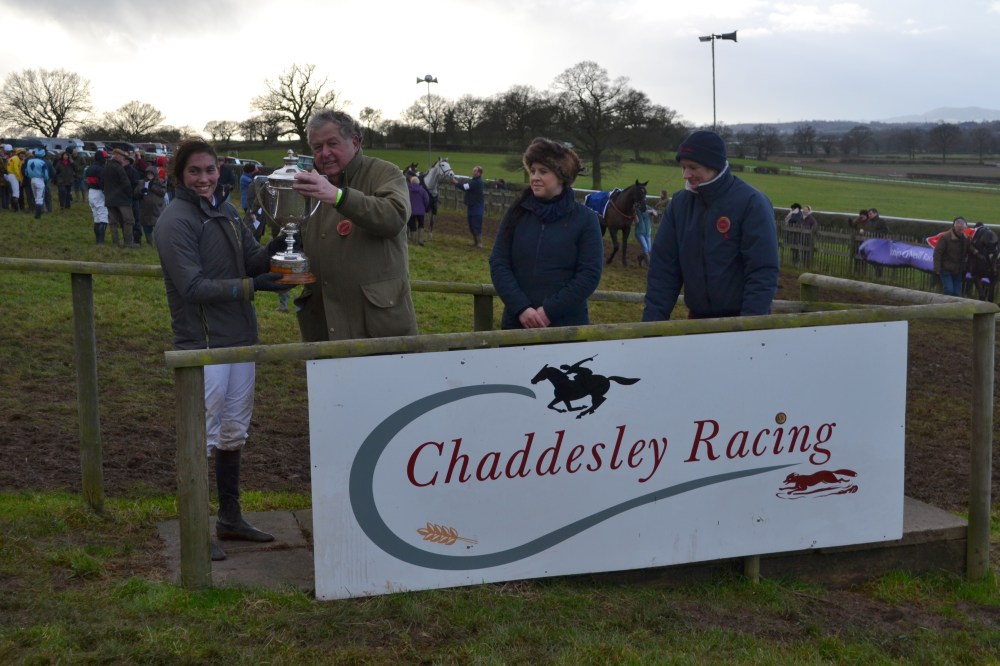 Grand National winning owner John Hales presents Ali Galliers-Pratt with the Marsh Challenge Cup