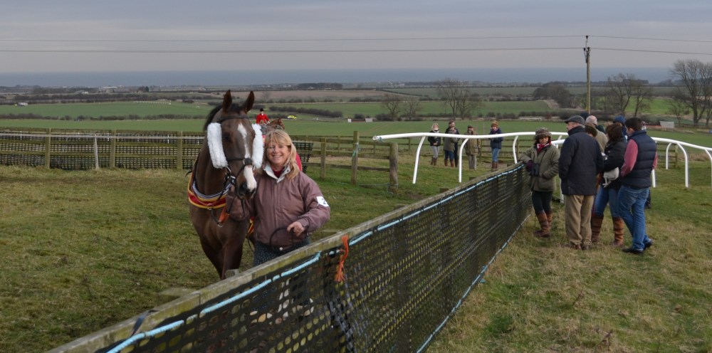 National Hunt trainer Lawney Hill leads up Earl Grez before the Restricted race
