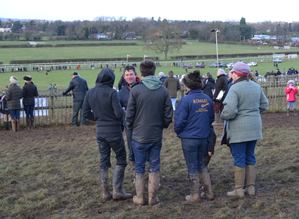 Philip Rowley (facing camera) holds court in the paddock