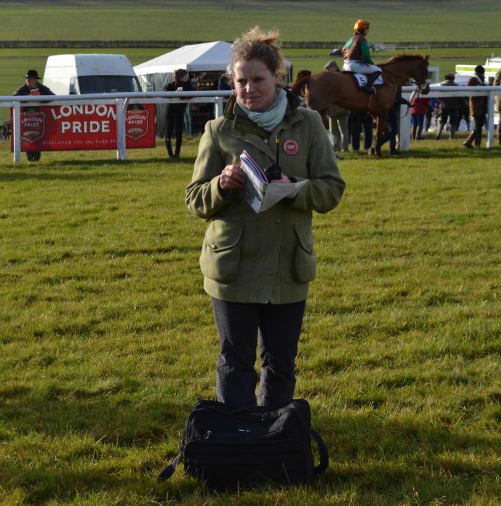 Veterinary surgeon Natasha Seely casts her eye over the runners in the paddock