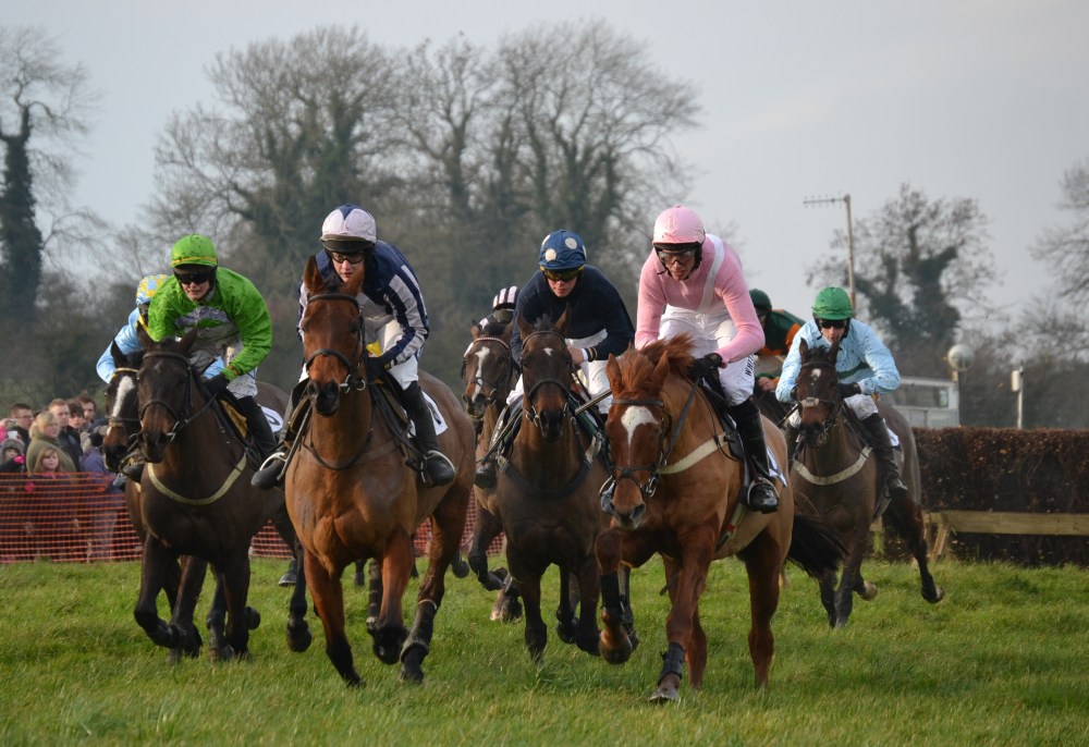 15 year old former AGA champion Amicelli (pink & blue striped sleeves)  leads on the first circuit of the YAPPC Club Members Riders Conditions (Div 2)