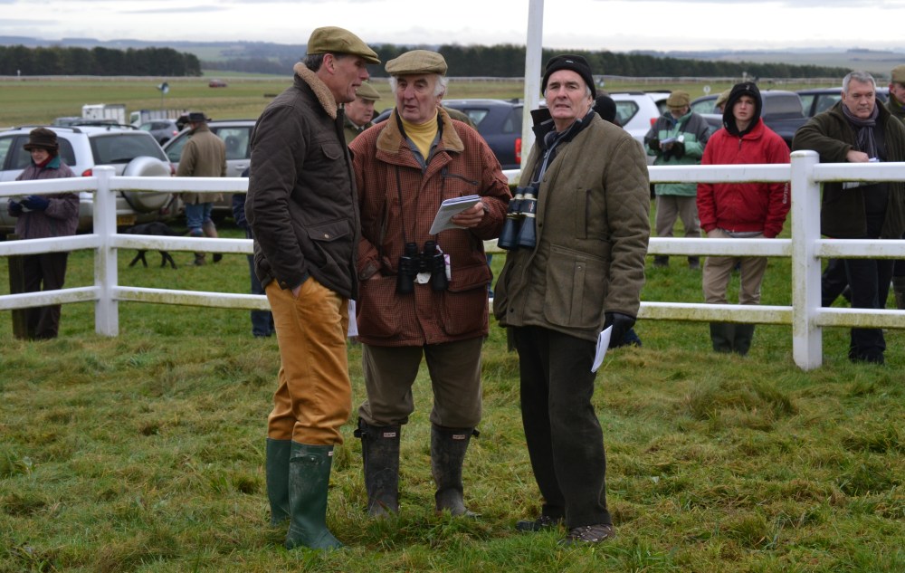 Alan Hill (far left, hands in pockets) enjoys a rare day off