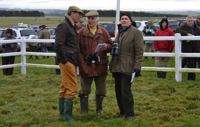 Alan Hill (far left, hands in pockets) enjoys a rare day off