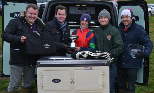 Channel 4 Racing's Nick Luck presents winning rider Catherine Walton with the Brightwells Challenge Trophy, along with David Simpson from AGA (far left) & owners Neil Mechie and Justin Landy
