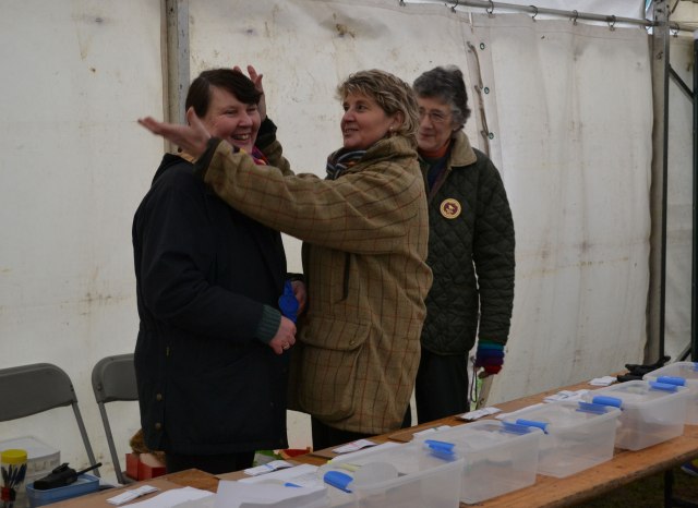 The Hon. Secretary, Hilary MacTaggart has fun in the decs tent with colleagues Jane Allison & Annie Gardiner