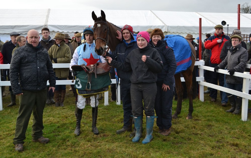 The Dodson & Horrell PPORA Club Members has just been won by Raid Stane and owner/trainer Katie Scott is the second person to appear in the winners enclosure wearing one of THOSE hats!