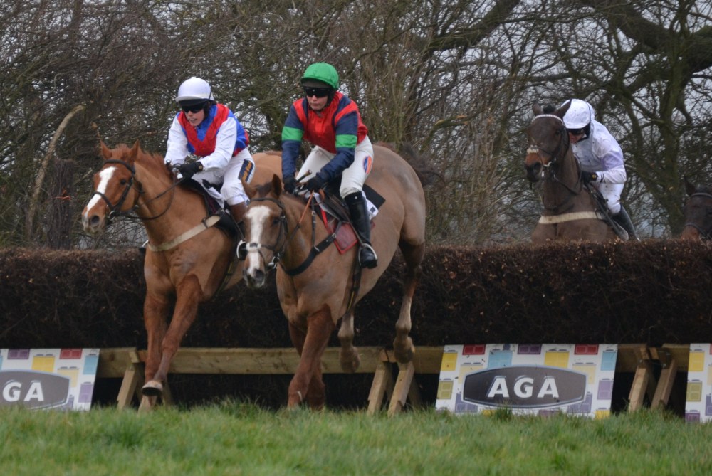 Eventual winner Ockey De Neulliac (green cap) leads Oaklands Robbie on the first circuit in the AGA Ladies Open at Sheriff Hutton