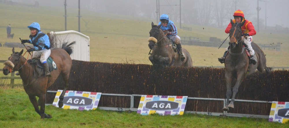 Newyearsresolution (Amie Waugh) far left, jumps the last ahead of Non Dom (Siobhan Doolan) centre, and eventual winner Sacred Mountain (Catherine Walton) in the AGA Ladies Open race 