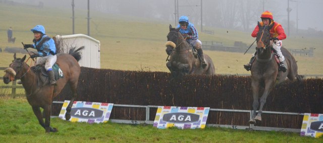 Newyearsresolution (Amie Waugh) far left, jumps the last ahead of Non Dom (Siobhan Doolan) centre, and eventual winner Sacred Mountain (Catherine Walton) in the AGA Ladies Open race 