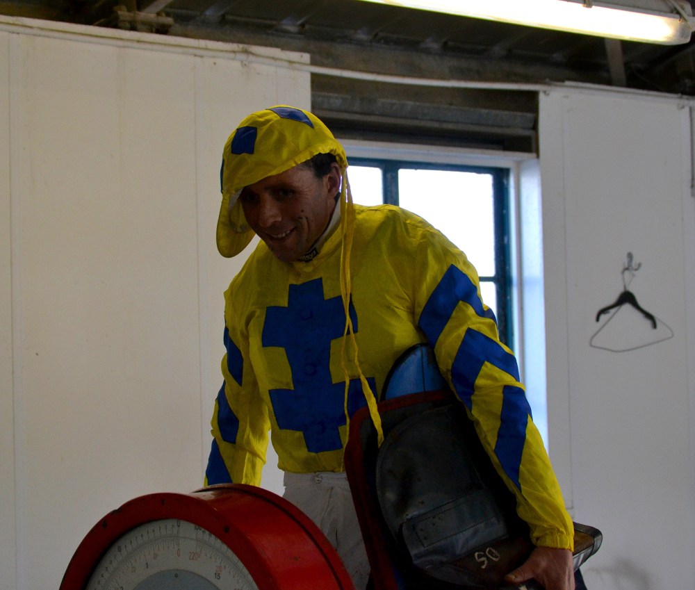 Mark Wall weighs out for the Coronation Cup