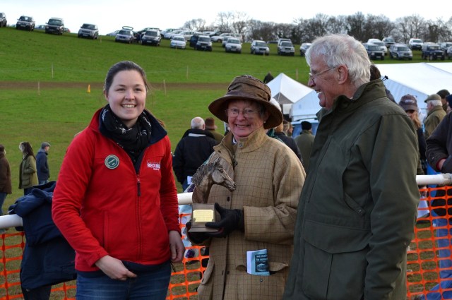 Mr and Mrs A Knox are all smiles as they receive the Humphrey Scott Memorial Trophy from Laura (Connolly's Red Mills)