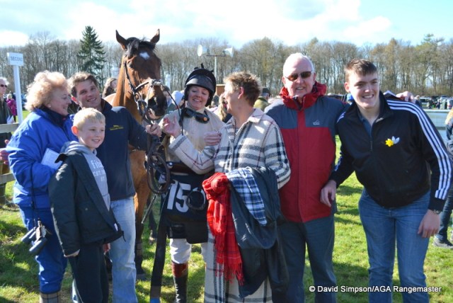 Delight in the winners enclosure for Hannah Lewis, husband Adrian Wintle and connections of Shoreacres