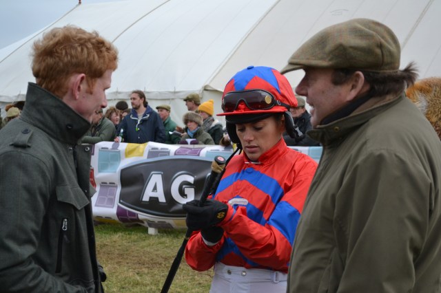 Marcus Foley and Nicky Henderson flank Camilla in the paddock