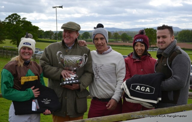 Adam Giles (far right) does the honours