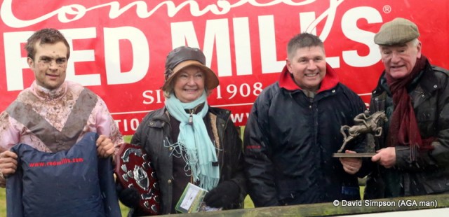 Dai Jones gets wet, but he did have the best sponsors banner!