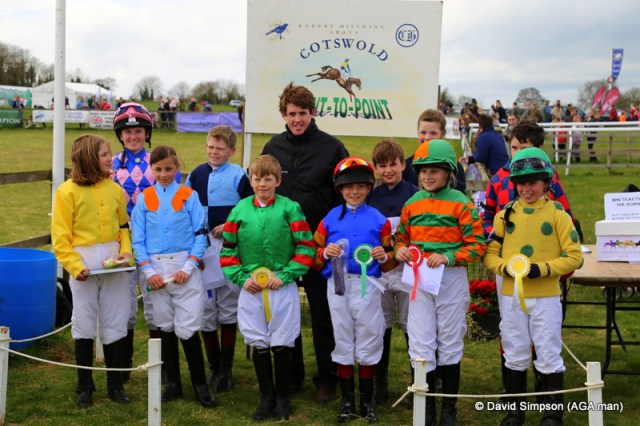 The pony riders line up with National Hunt jockey,  Jason McGuire