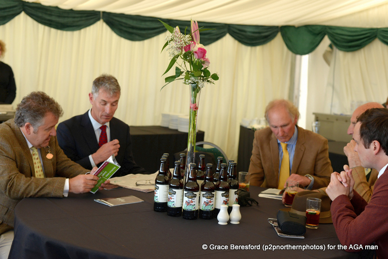 Nigel and Andrew Norman were on course early (right) and were soon getting stuck into the race card, along with Carl Evans (centre) and the AGA man!