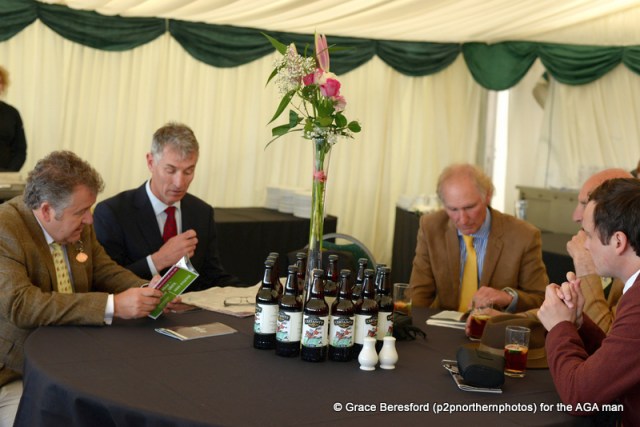 Nigel and Andrew Norman were on course early (right) and were soon getting stuck into the race card, along with Carl Evans (centre) and the AGA man!
