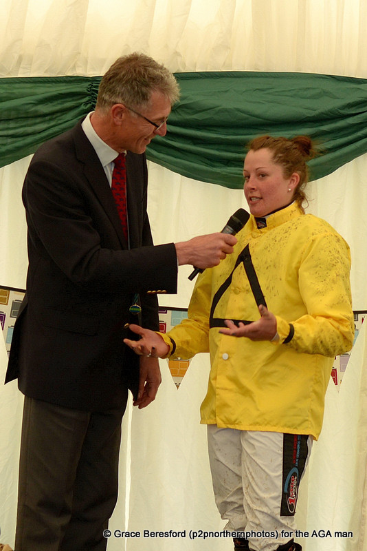 The first race of the evening was the inaugural Subaru Restricted final, which was won by Claire Hart and Dabinett Moon. Claire was whisked away from the winners enclosure and gave a great interview in the AGA marquee, still mud spattered and in her silks, Carl Evans asked the questions!