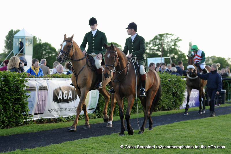 A nice touch as two Hunt horses lead our winner in