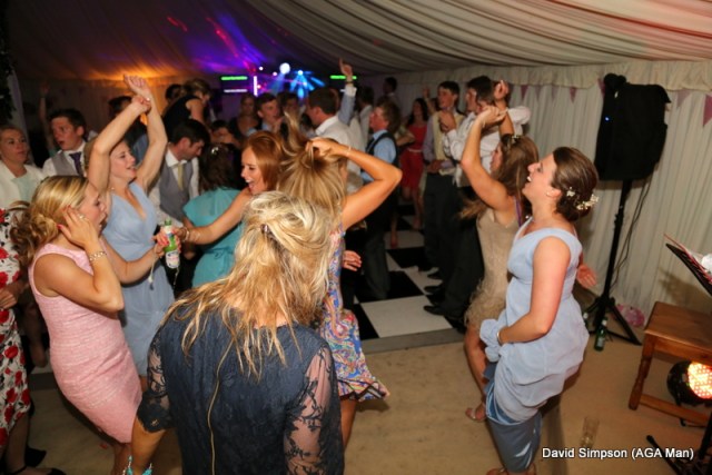 The bride is in the thick of the action!