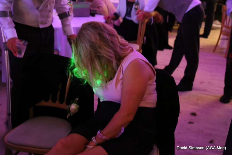 Lawney has also packed up! The groom can be seen moving away in the background, he's off to look for someone who will stay awake while he's chatting to them!