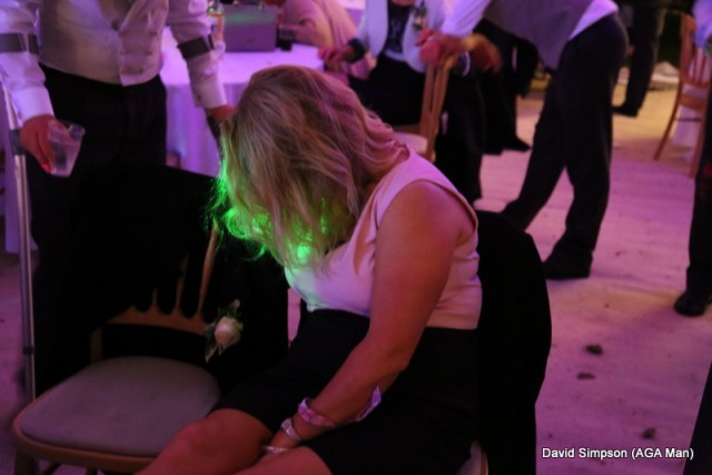 Lawney has also packed up! The groom can be seen moving away in the background, he's off to look for someone who will stay awake while he's chatting to them!